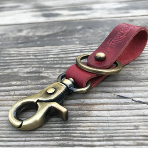 
                  
                    TRIP MACHINE KEY FOB CHERRY RED / ANITQUE GOLD
                  
                