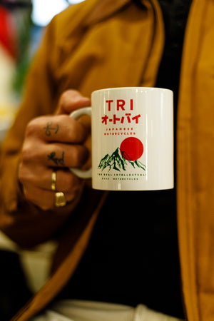 
                  
                    TRI JAPAN CERAMIC MUG
                  
                